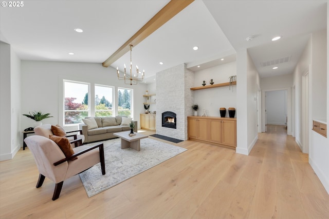 13212 SE Terra Cascade Dr, Happy Valley, OR 97086 - living room featuring light wood finished floors, a fireplace, a chandelier, recessed lighting, and baseboards