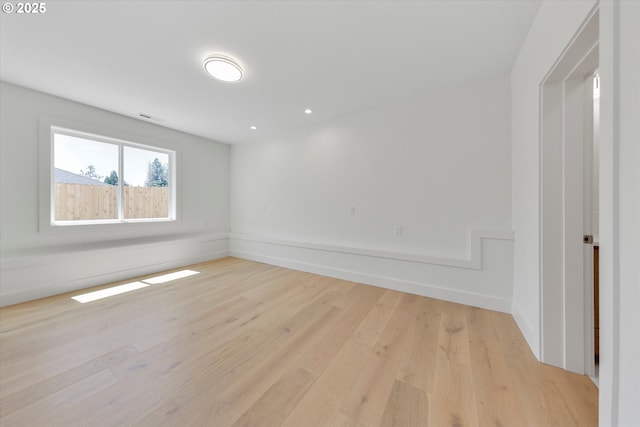 13212 SE Terra Cascade Dr, Happy Valley, OR 97086 - empty room featuring light wood-style flooring, baseboards, and recessed lighting