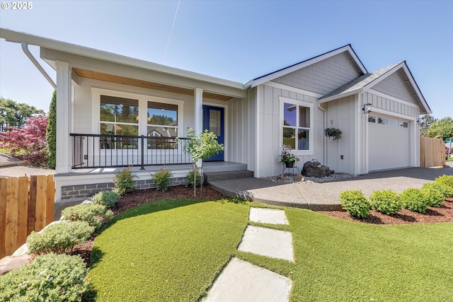 13212 SE Terra Cascade Dr, Happy Valley, OR 97086 - ranch-style house with a porch, board and batten siding, and an attached garage