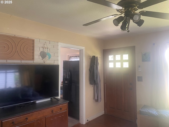 3802 C St, Washougal, WA 98671 - entrance foyer featuring a ceiling fan, dark wood-type flooring, baseboards, and a textured ceiling