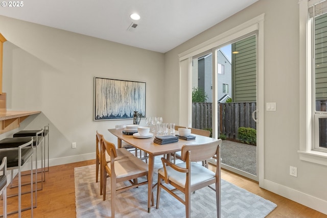 16185 NW Ashfield Dr, Beaverton, OR 97006 - dining area with baseboards, light wood-style floors, and recessed lighting