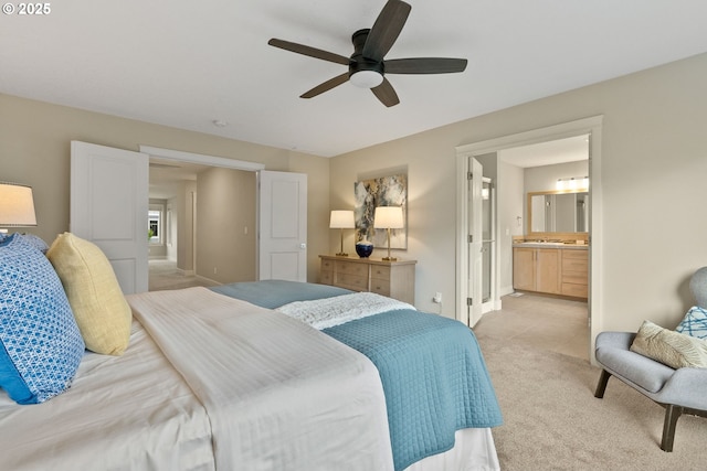 16185 NW Ashfield Dr, Beaverton, OR 97006 - bedroom featuring light carpet, connected bathroom, a ceiling fan, and baseboards