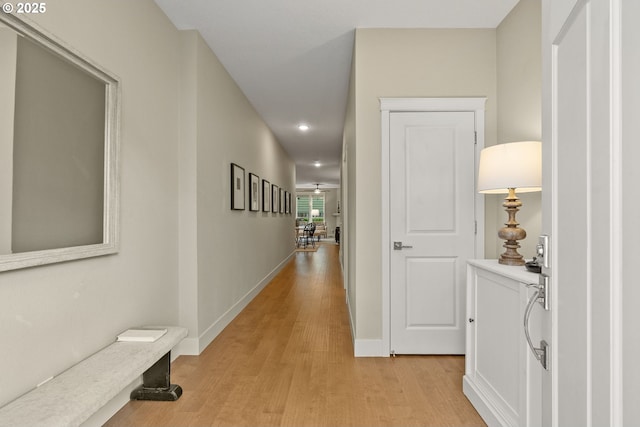 16185 NW Ashfield Dr, Beaverton, OR 97006 - hallway with light wood-type flooring, recessed lighting, and baseboards
