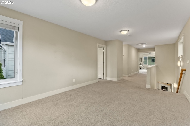 16185 NW Ashfield Dr, Beaverton, OR 97006 - carpeted spare room with baseboards