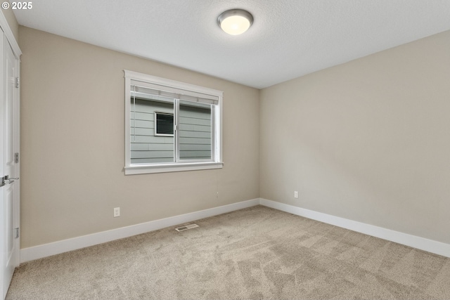 16185 NW Ashfield Dr, Beaverton, OR 97006 - carpeted spare room with baseboards