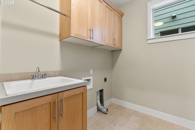 16185 NW Ashfield Dr, Beaverton, OR 97006 - washroom featuring hookup for an electric dryer, cabinet space, and baseboards