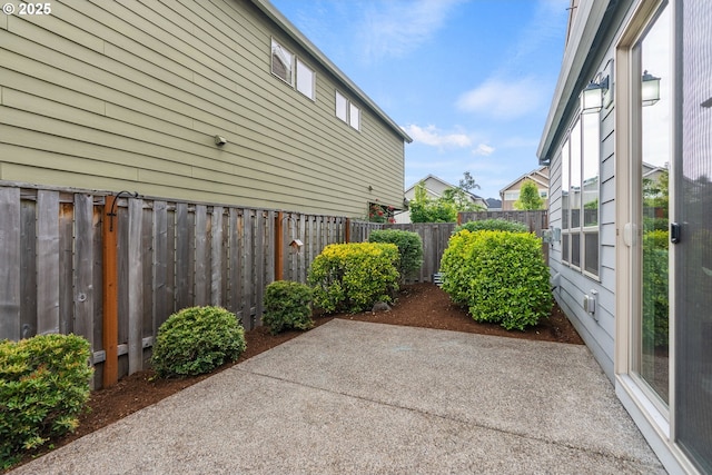 16185 NW Ashfield Dr, Beaverton, OR 97006 - fenced backyard featuring a patio