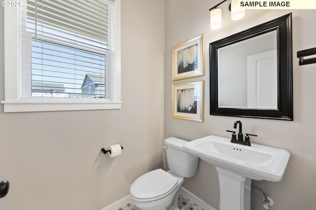 8510 NE 134th Ave Lot 87, Vancouver, WA 98685 - half bathroom featuring baseboards, toilet, and marble finish flooring