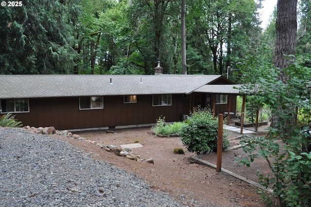 89016 Bridge St, Springfield, OR 97478 - view of front of house with roof with shingles and a wooded view