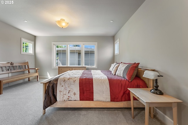 bedroom featuring carpet floors, baseboards, and recessed lighting