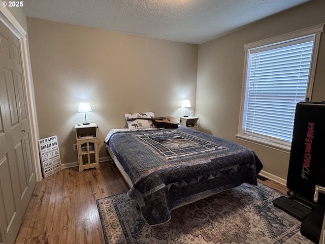 1809 Balm St, Baker City, OR 97814 - bedroom with hardwood / wood-style flooring and a textured ceiling