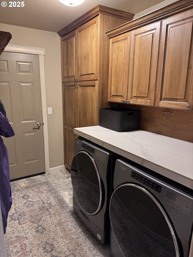 1809 Balm St, Baker City, OR 97814 - laundry room featuring independent washer and dryer, cabinet space, and light marble finish flooring
