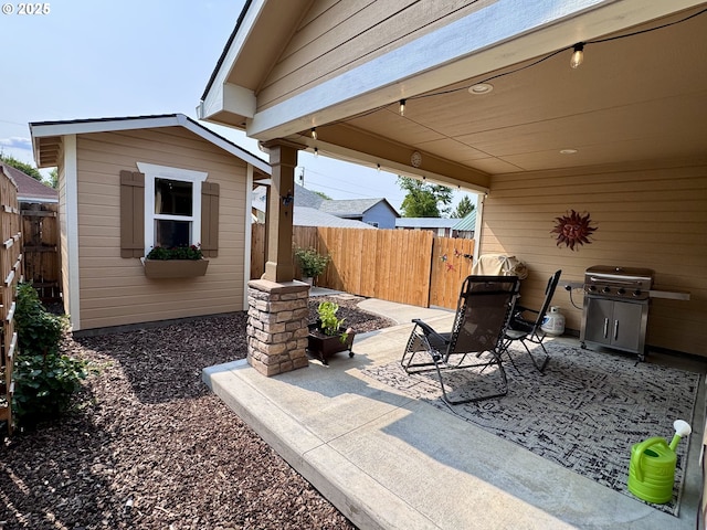 1809 Balm St, Baker City, OR 97814 - view of patio / terrace featuring a grill and a storage shed