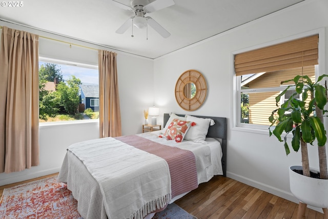 6736 N Haight Ave, Portland, OR 97217 - bedroom featuring hardwood / wood-style floors, baseboards, and a ceiling fan