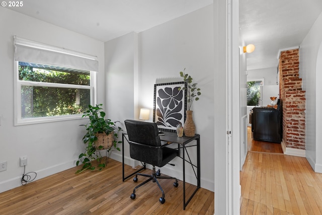6736 N Haight Ave, Portland, OR 97217 - home office featuring healthy amount of natural light, hardwood / wood-style floors, and baseboards