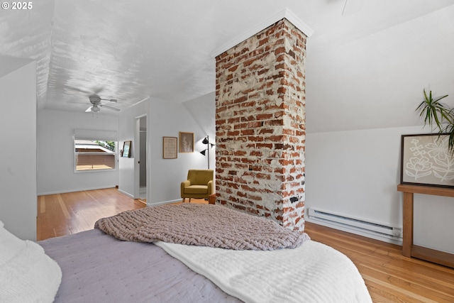 6736 N Haight Ave, Portland, OR 97217 - bedroom featuring a baseboard heating unit, wood finished floors, a ceiling fan, and baseboards