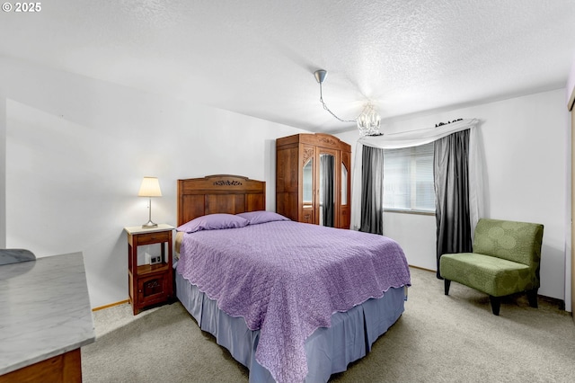 bedroom with light carpet, an inviting chandelier, baseboards, and a textured ceiling