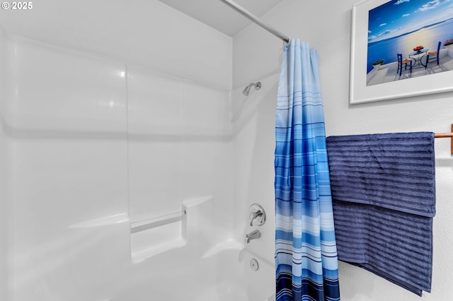 full bath with shower / bath combination with curtain