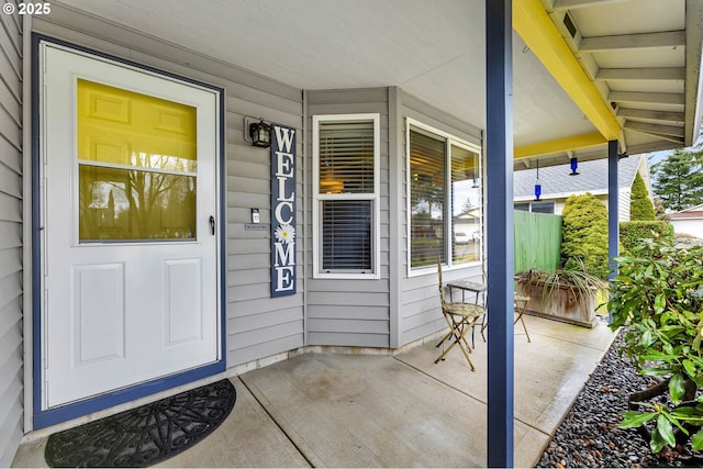 property entrance featuring a porch