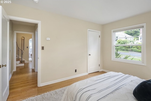 8100 SW 6th Ave, Portland, OR 97219 - bedroom with light wood-style floors and baseboards