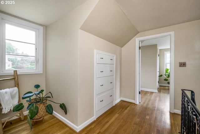 8100 SW 6th Ave, Portland, OR 97219 - hallway with wood finished floors, baseboards, and lofted ceiling