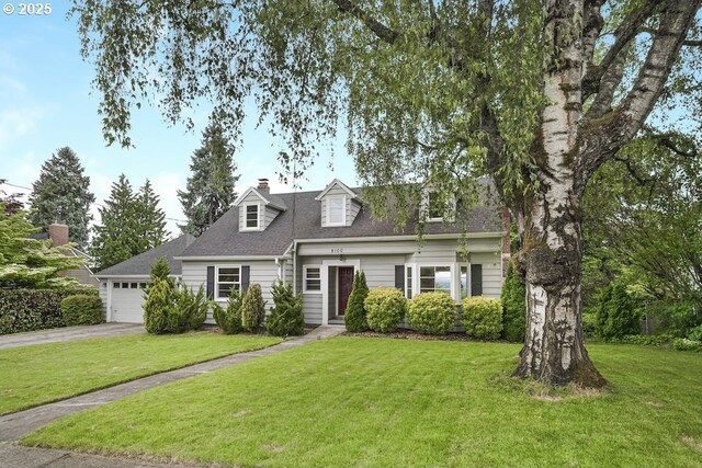 8100 SW 6th Ave, Portland, OR 97219 - cape cod home with asphalt driveway, a front lawn, an attached garage, roof with shingles, and a chimney