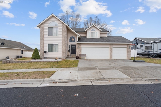 traditional home with brick siding, roof with shingles, central AC, a garage, and driveway