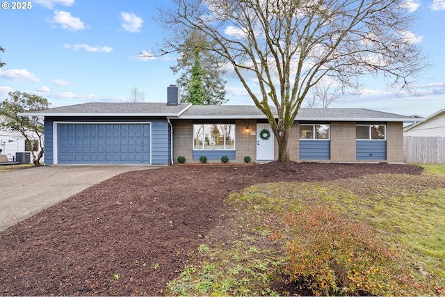 ranch-style home featuring a garage