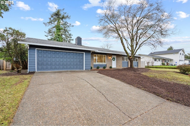 ranch-style home with a garage