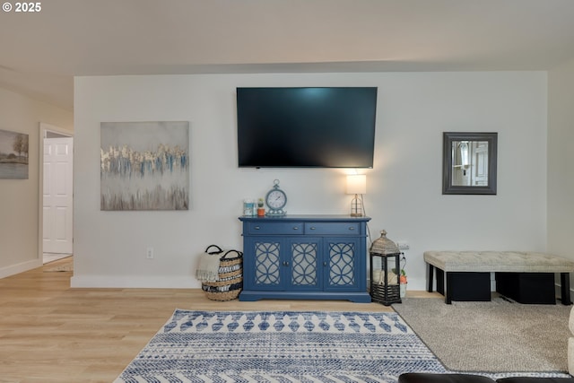 156 1st Ave, Coos Bay, OR 97420 - living room featuring baseboards and wood finished floors