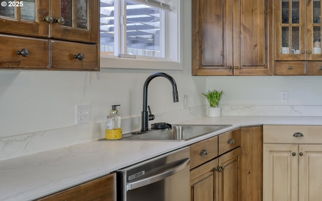 156 1st Ave, Coos Bay, OR 97420 - kitchen with dishwasher, a sink, and glass insert cabinets