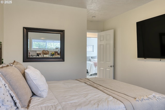 156 1st Ave, Coos Bay, OR 97420 - bedroom with a textured ceiling