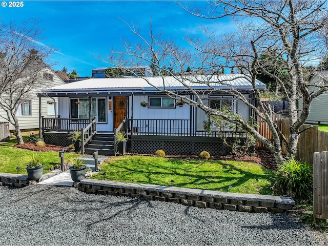 156 1st Ave, Coos Bay, OR 97420 - view of front of house featuring metal roof, board and batten siding, and a porch