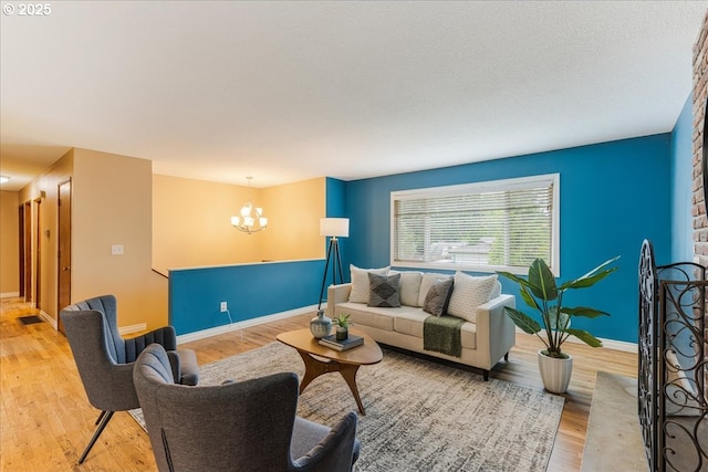 11995 SW 119th Ave, Portland, OR 97223 - living room with a chandelier and wood finished floors