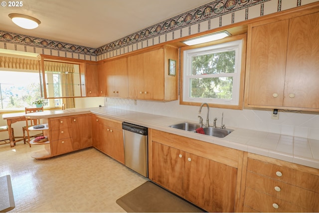 383 Little Valley Rd, Roseburg, OR 97471 - kitchen with light floors, stainless steel dishwasher, a sink, and a wealth of natural light