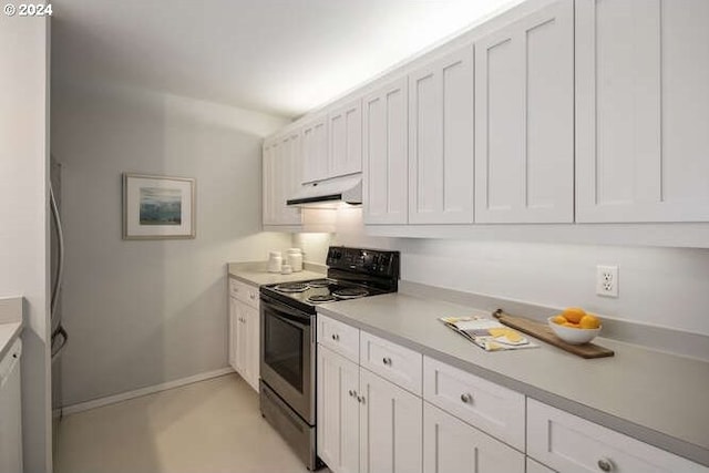 1710 S Harbor Way Unit C405, Portland, OR 97201 - kitchen featuring range with electric cooktop, under cabinet range hood, light countertops, and white cabinets