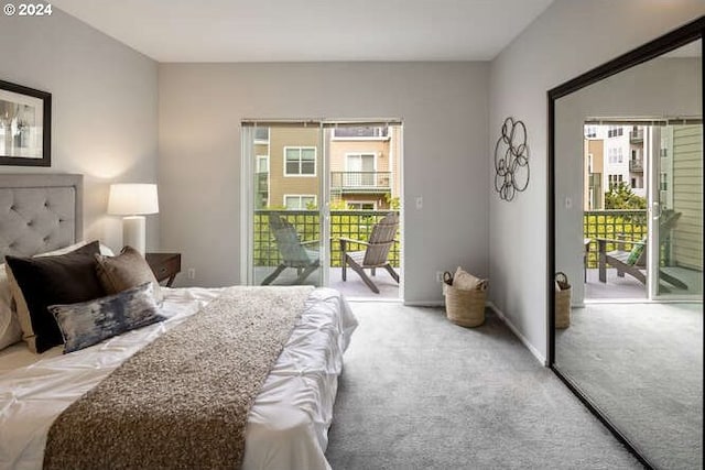 1710 S Harbor Way Unit C405, Portland, OR 97201 - bedroom with access to outside and light carpet