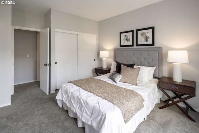 carpeted bedroom with a closet