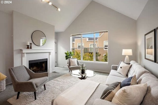 1710 S Harbor Way Unit C405, Portland, OR 97201 - carpeted living room featuring high vaulted ceiling, a fireplace with flush hearth, and baseboards