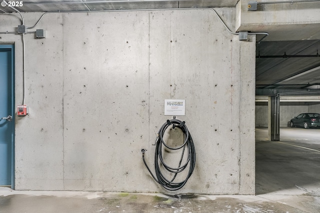 1710 S Harbor Way Unit C405, Portland, OR 97201 - garage view of concrete floors and a garage door opener