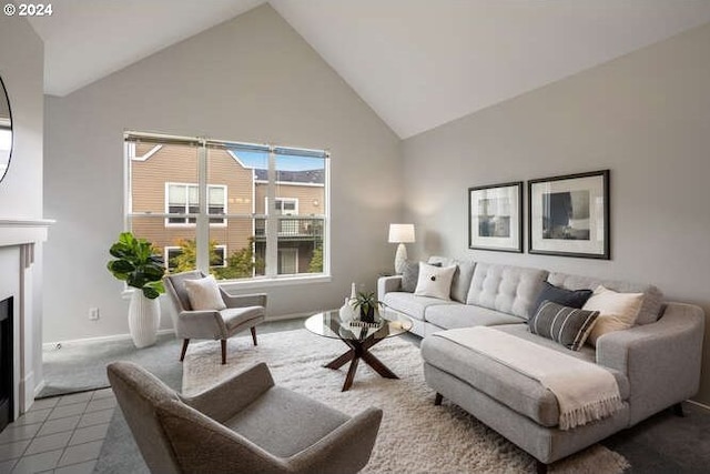 1710 S Harbor Way Unit C405, Portland, OR 97201 - carpeted living area featuring high vaulted ceiling, a fireplace with flush hearth, and baseboards