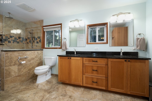 15928 N Umpqua Hwy, Roseburg, OR 97470 - bathroom with toilet, tiled shower, and double vanity