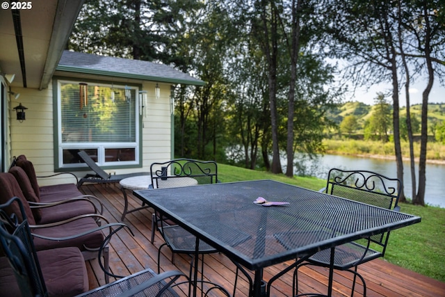 15928 N Umpqua Hwy, Roseburg, OR 97470 - wooden deck featuring outdoor dining space, a water view, and a yard