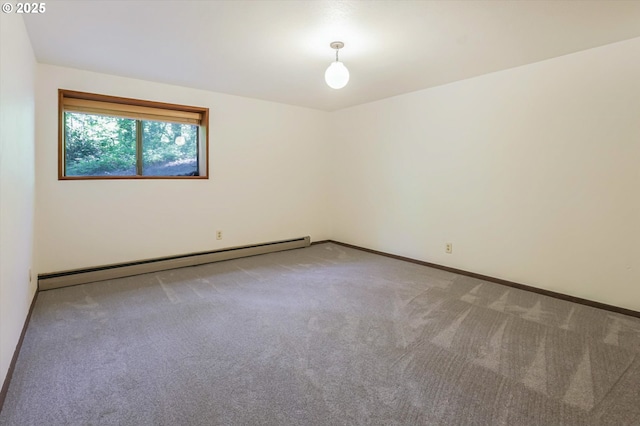 18020 SW Neugebauer Rd, Hillsboro, OR 97123 - unfurnished room with a baseboard heating unit, carpet flooring, and baseboards