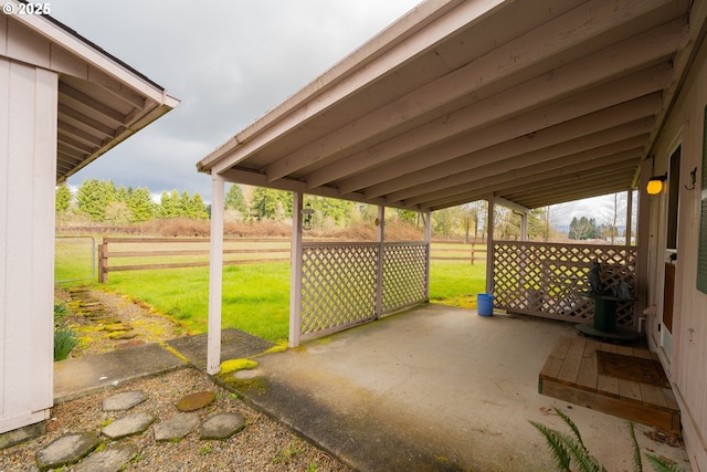 view of patio with a rural view