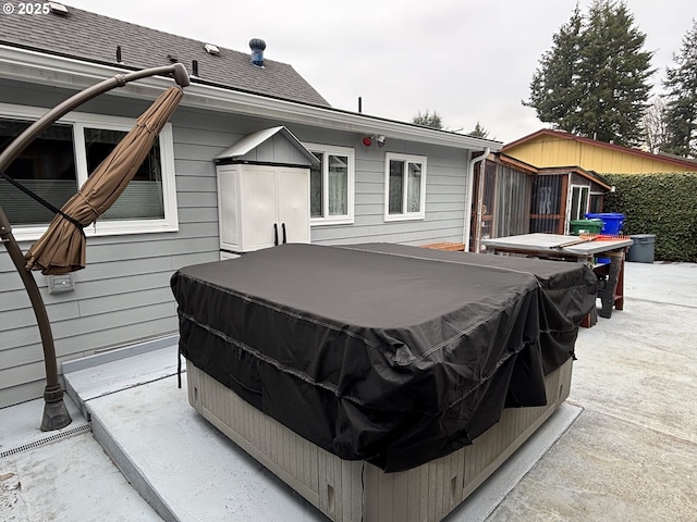 view of patio / terrace featuring a hot tub