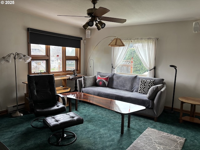 carpeted living room featuring a ceiling fan and baseboard heating