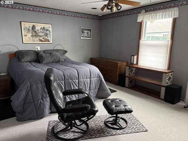 bedroom with carpet floors and a ceiling fan