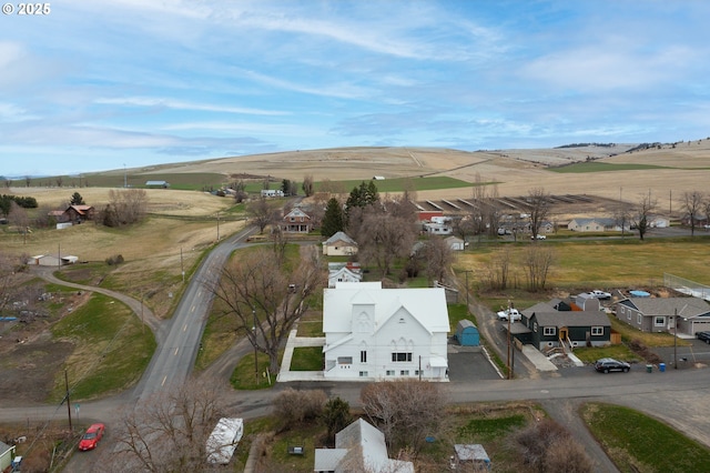 birds eye view of property featuring a residential view and a rural view