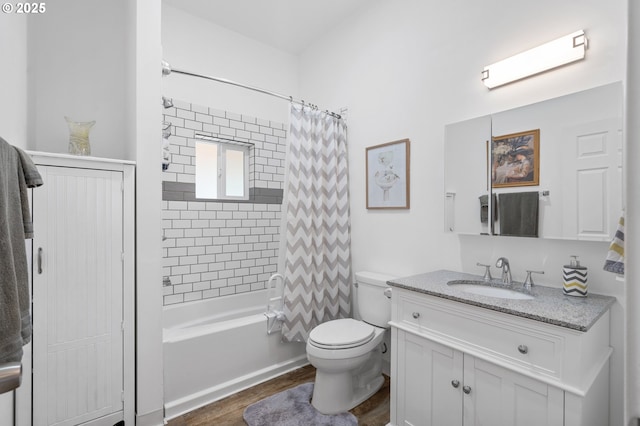 full bathroom with shower / tub combo, vanity, toilet, and wood finished floors